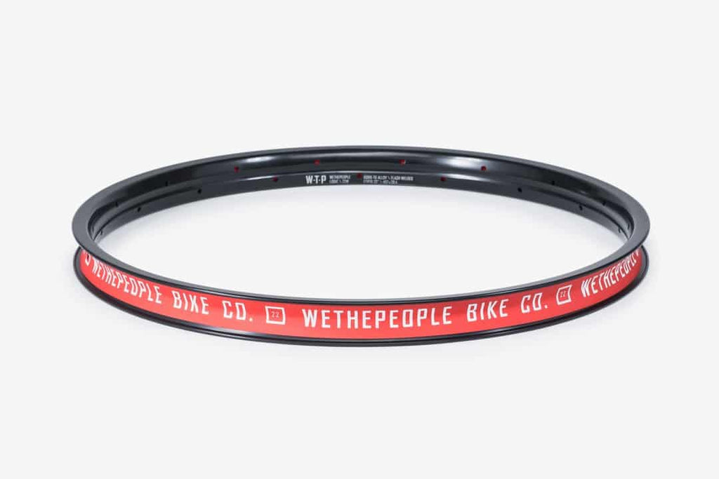 Wethepeople Logic BMX rim in black with red branding around the edge.