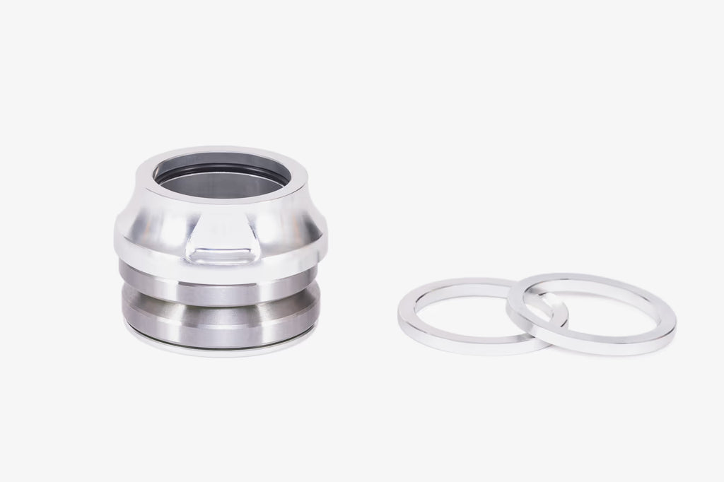 WeThePeople WTP Compact BMX headset in silver with bearing races and matching silver spacer rings on white background
