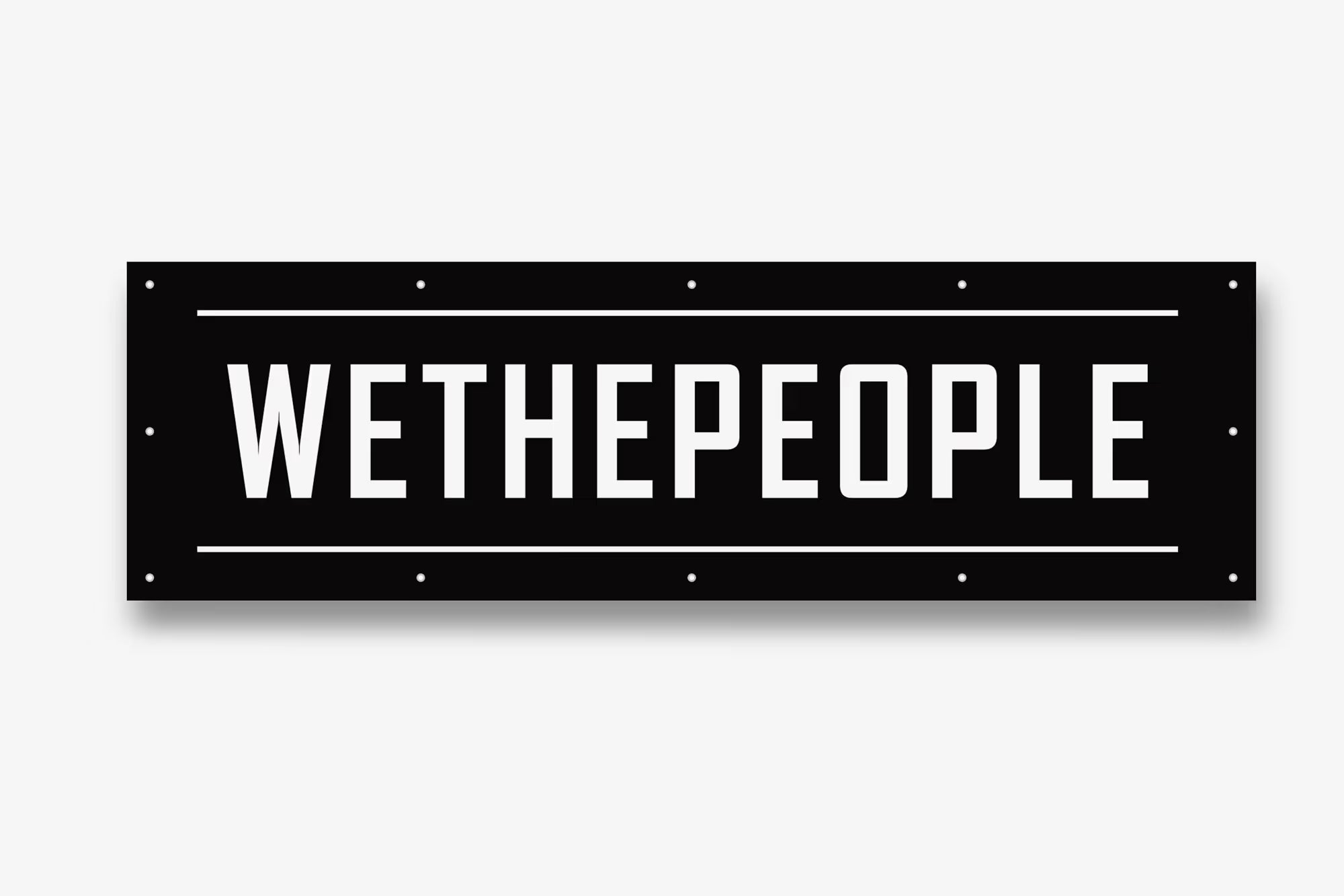 Wethepeople BMX brand logo on a black rectangular sign with white text and border lines