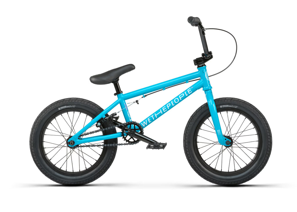 Blue bicycle with black wheels on a white background