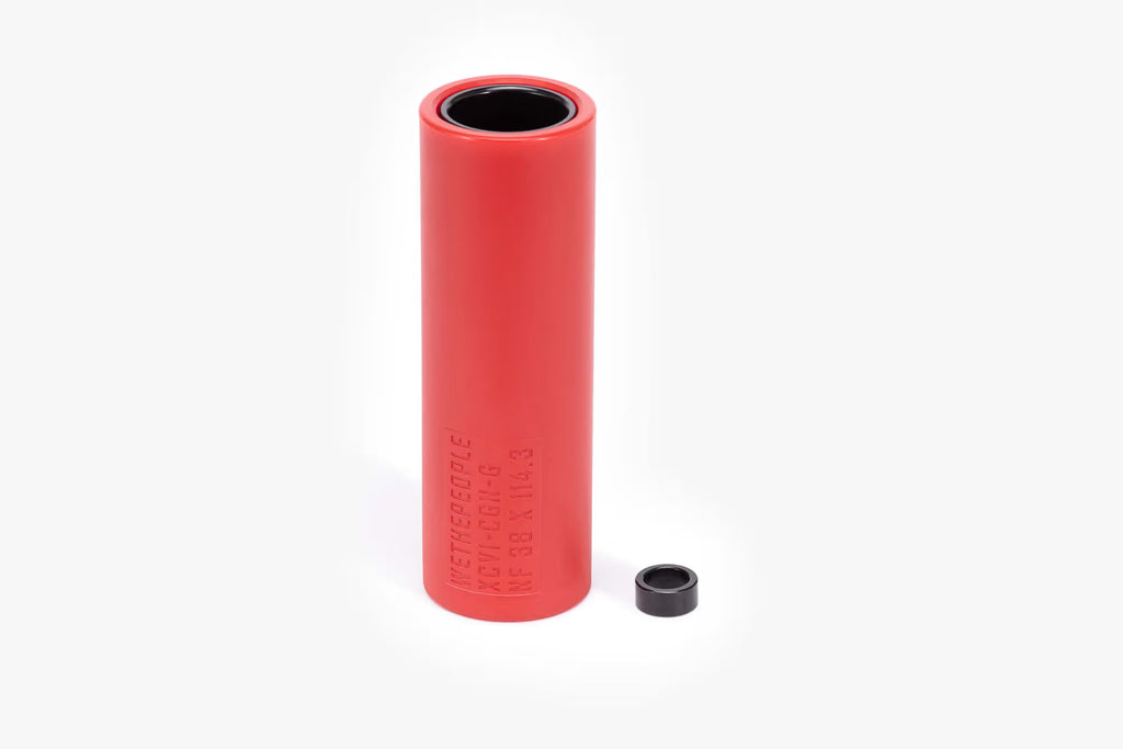 Wethepeople (WTP) Temper BMX Peg in a vibrant red nylon sleeve, shown with the small black end cap/washer detached, highlighting the laser-etched specifications.