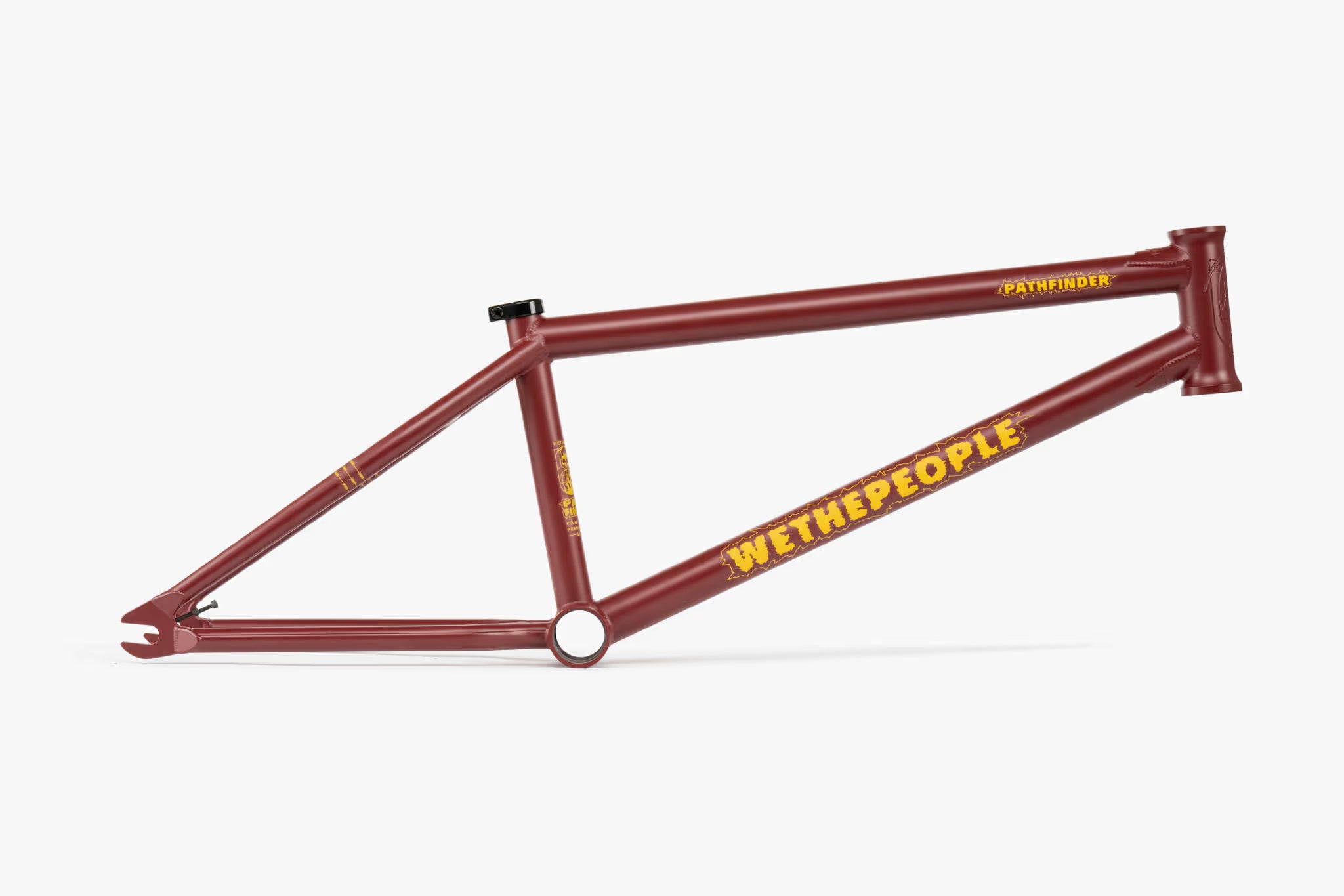 We The People Pathfinder BMX frame in matte burgundy, Felix Prangenberg signature model, with yellow 'PATHFINDER' and 'WETHEPEOPLE' branding on the frame. Ideal for street and park riding