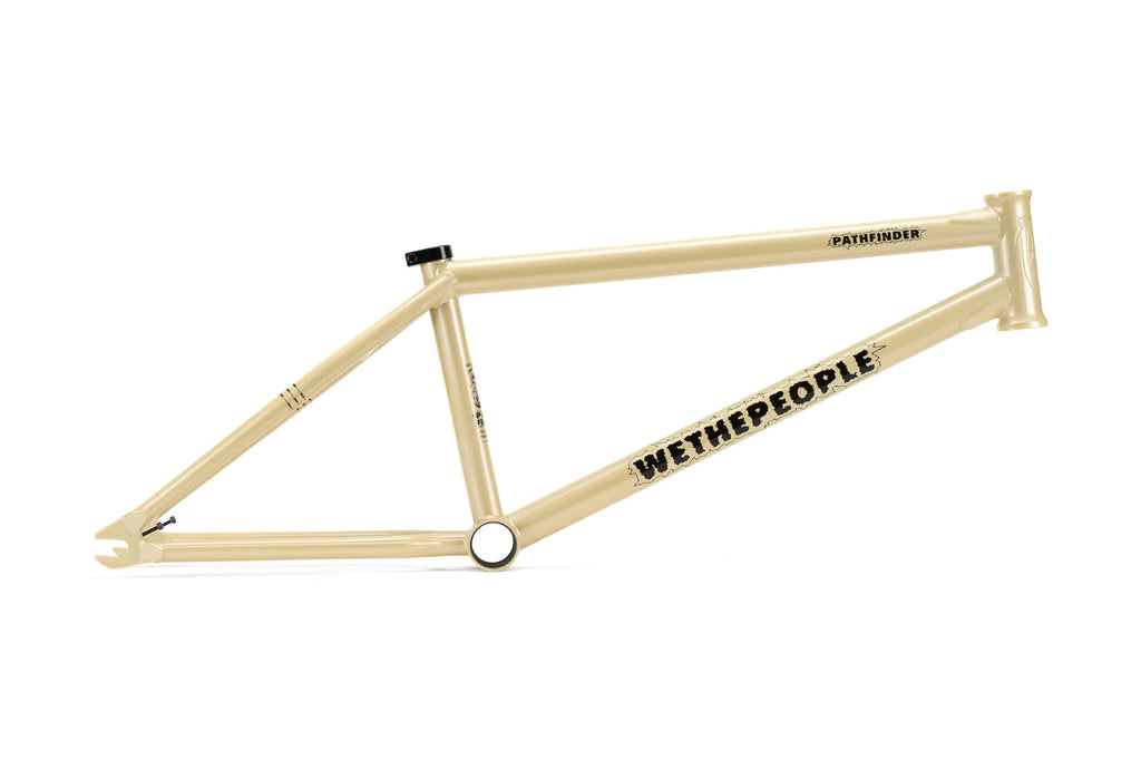 We The People Pathfinder BMX frame in a matte beige finish, featuring Felix Prangenberg's signature design and 'WETHEPEOPLE' logo on the downtube. Ideal for street riding