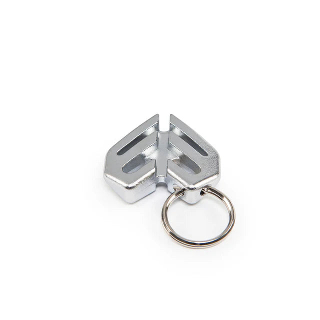 Éclat Key Chain (keyring) charm in a polished silver/chrome finish, featuring the Éclat logo and an attached metal keyring.