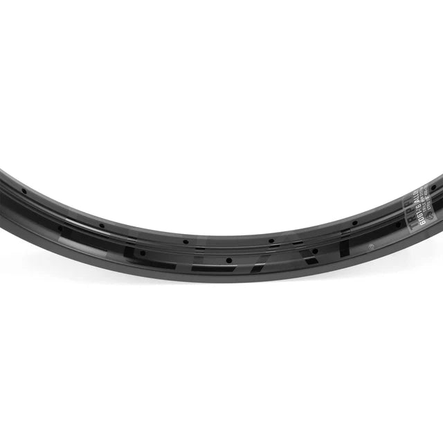 Close-up top view of the Éclat Trippin double-wall BMX rim in stealth black, showcasing the spoke holes and technical specifications decal.