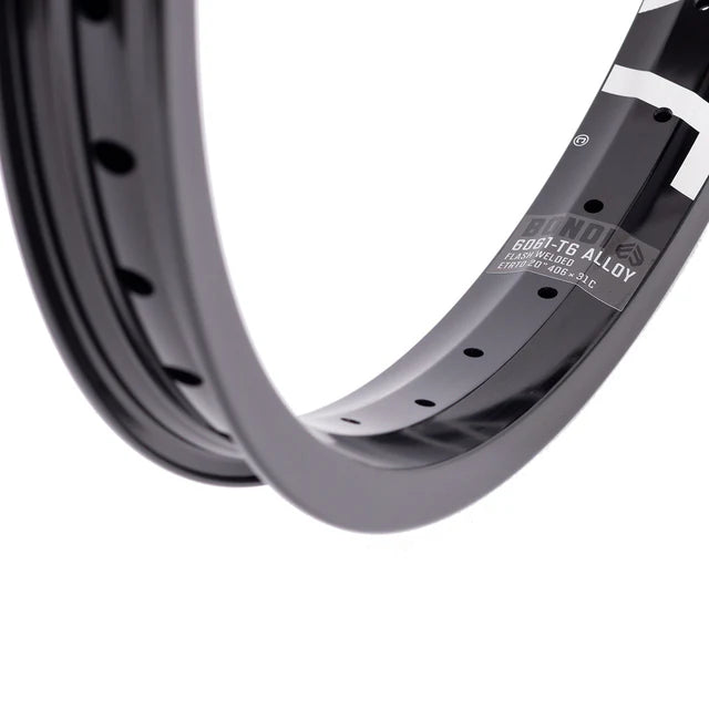 Close-up view of the Éclat Bondi straight-wall BMX rim in black, focusing on the decal with 6061-T6 alloy material and Flash Welded construction details.