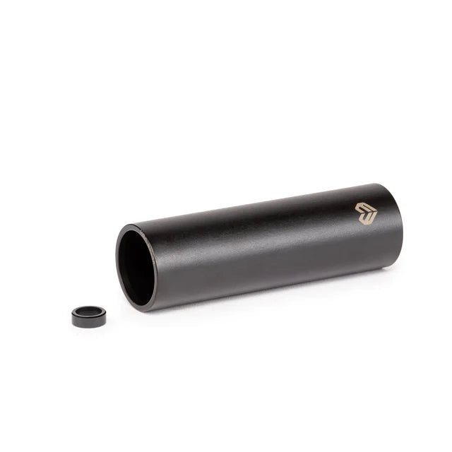 Éclat Dura BMX Peg, black finish, angled view showing the smooth exterior, open end, Éclat logo, and the small anti-rotation washer beside it.