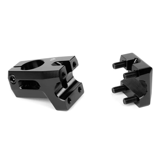 Éclat Felix front load BMX stem disassembled: main body on the left and faceplate with four bolts on the right, black finish.