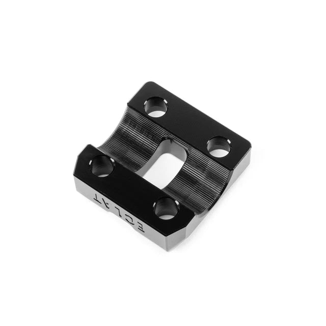 Close-up view of the Éclat Felix top load BMX stem faceplate, black, showing the grooved clamping surface and bolt holes.