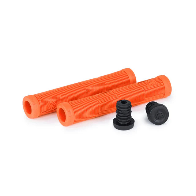 Éclat Pulsar BMX grips, bright orange color, shown with the two black push-in bar ends disassembled from the ribbed grips.