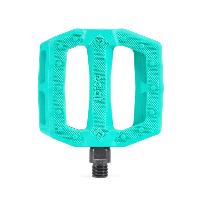 Turquoise bicycle pedal on a white background