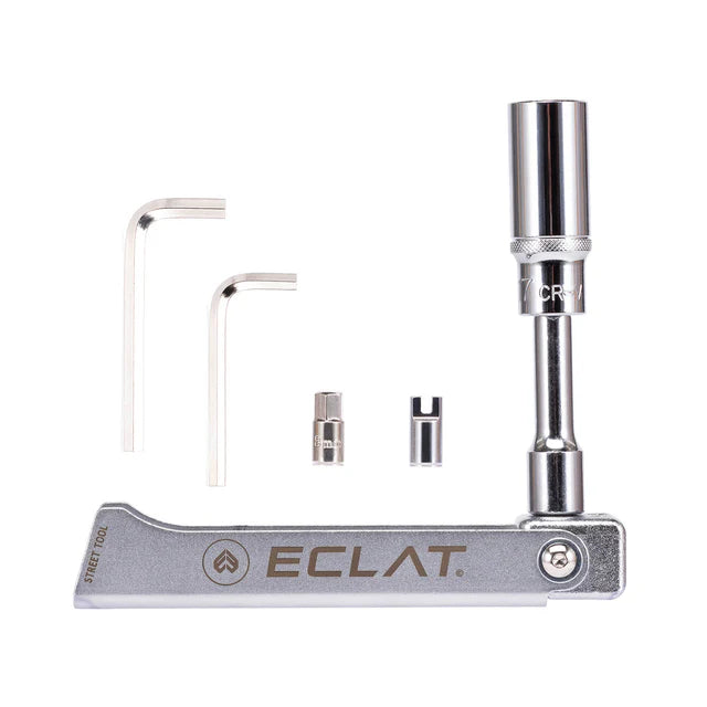 Éclat Street Tool, silver, laid out showing the main body, two hex keys, spark plug socket, and hex bit adapters for a complete BMX repair kit.