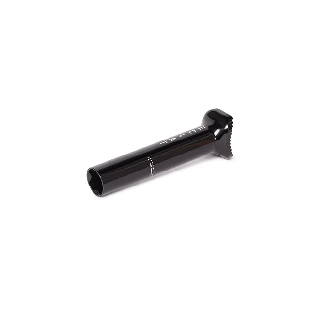 Éclat Torch pivotal seat post, 135mm short version, black, low-angle horizontal view showing the hollow tube and the vertical ÉCLAT logo.