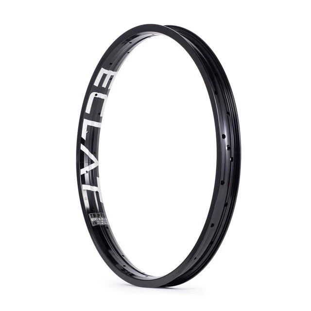 Éclat Trippin double-wall BMX rim, all-black finish, angled view showing the bold ÉCLAT sidewall logo and spoke nipple holes.