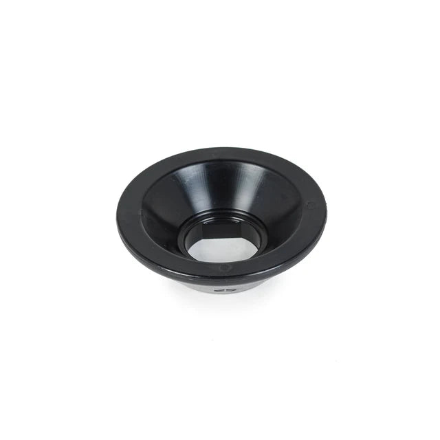 Internal view of the Éclat Viper Rear Hub Guard, black, showing the hollow, concave shape and the hexagonal axle opening.