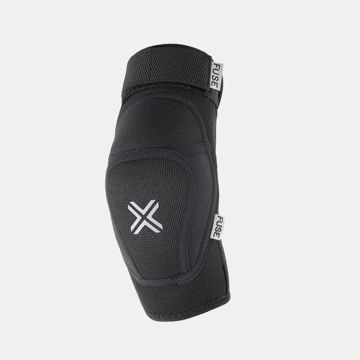 FUSE Alpha Classic Elbow Pad, black, front view showing the protective foam padding and the white FUSE 'X' logo on the cap.