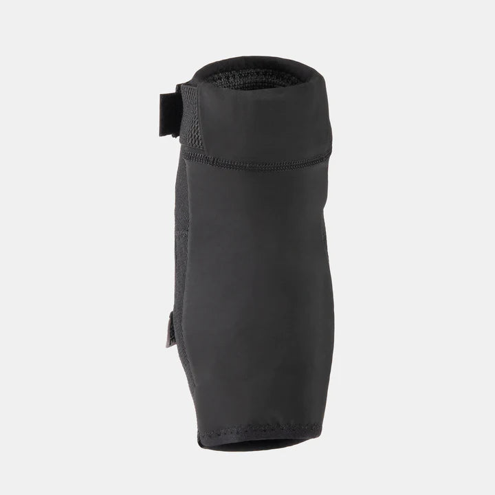 Rear view of the FUSE Alpha Classic Elbow Pad, black, showcasing the seamless sleeve design and the Velcro closure/strap at the top.