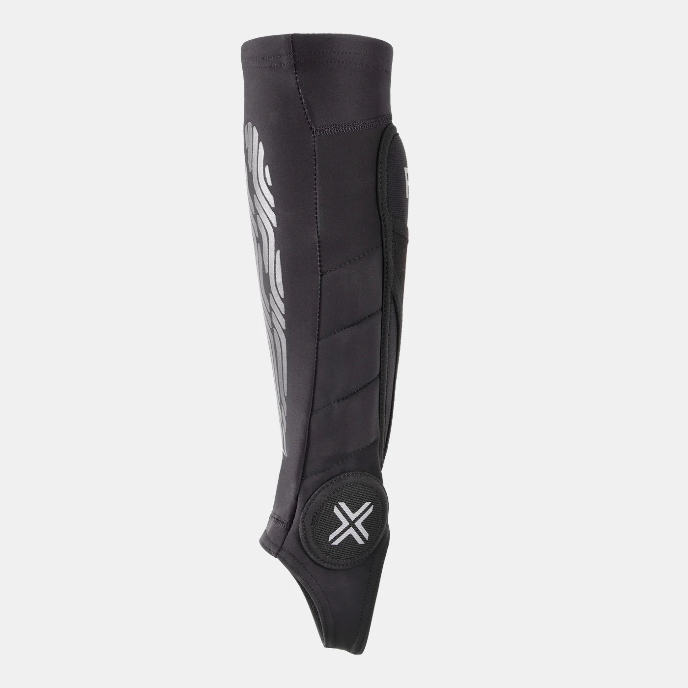 FUSE Omega Pro Shin Pad Combo, black, side view showing the calf muscle protection, graphic pattern, and the ankle protection pad with the white 'X' logo.