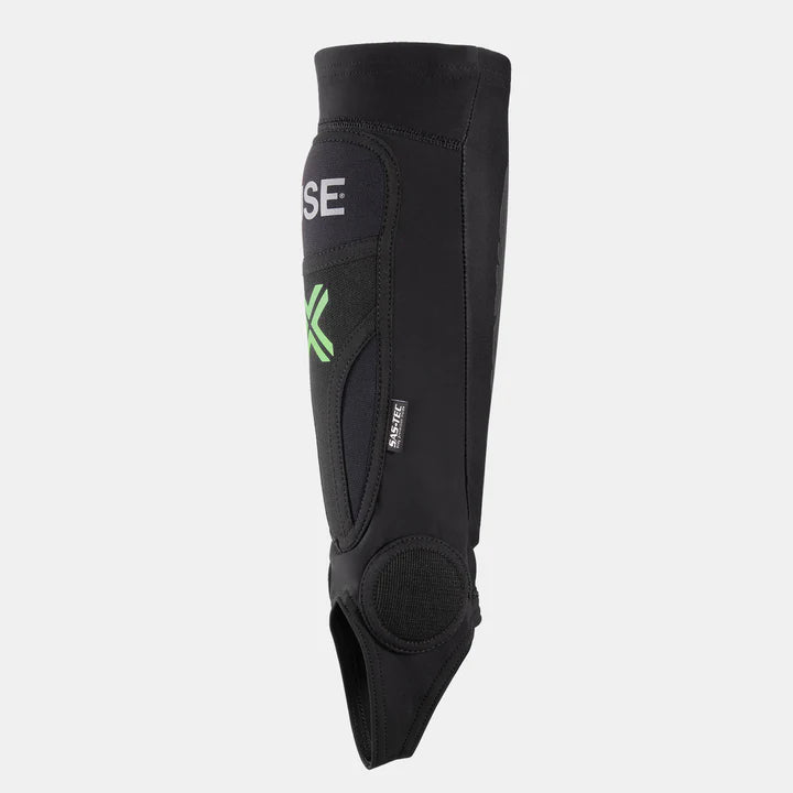 FUSE Omega Pro Shin Pad Combo, black, showing the protective profile with SAS-TEC foam, an integrated ankle guard, and a foot loop for secure fit.