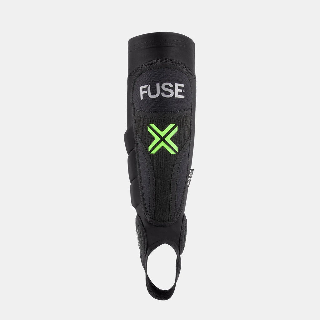 FUSE Omega Pro Shin Pad Combo, black, straight-on view highlighting the thick SAS-TEC impact foam and the bright neon green FUSE 'X' logo.