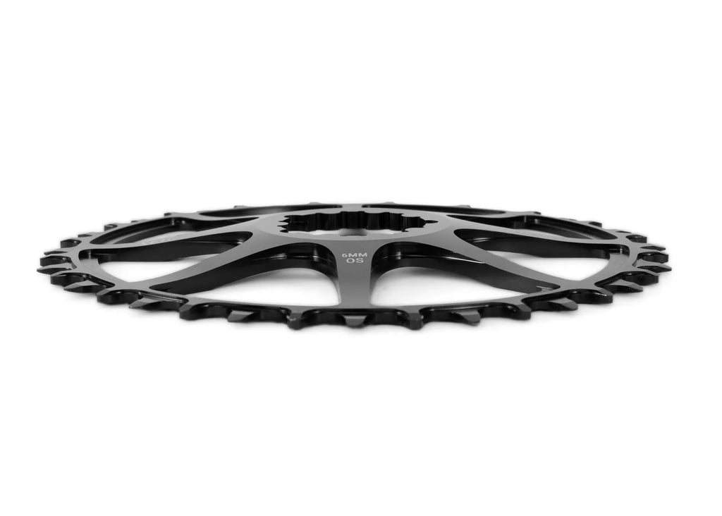 Side profile view of the SEIDO COIL Chainring, black, highlighting the 6mm offset (6MM OS) and the thickness of the wide-narrow tooth design.