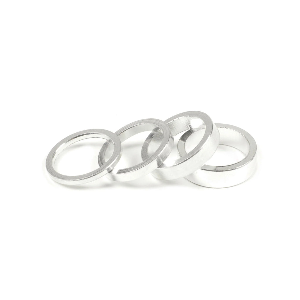 SALT BMX Headset Spacers set, featuring four different sizes of rings in a high polished silver/chrome finish for adjusting stem stack height