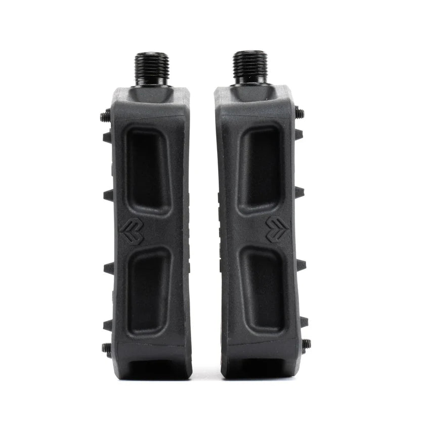 Two black textured footpegs on a white background