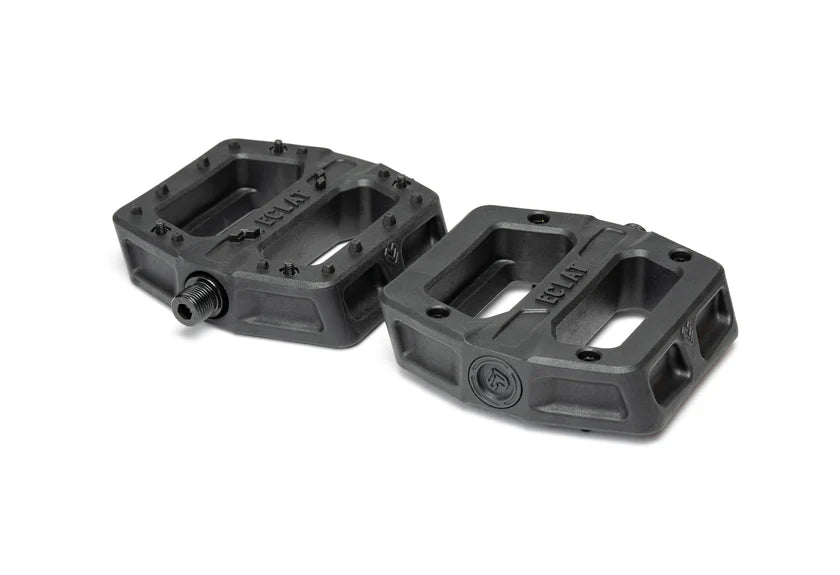 Two black bike pedals on a white background