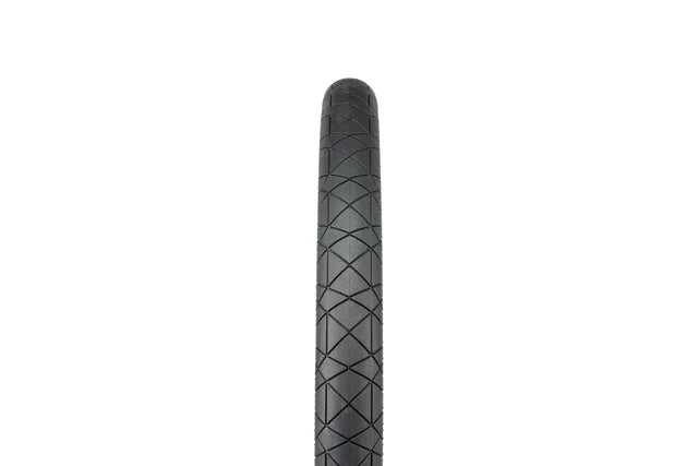 Éclat Mugen BMX Tire, 1.75" narrow width, all-black, straight-on view highlighting the continuous geometric tread pattern.