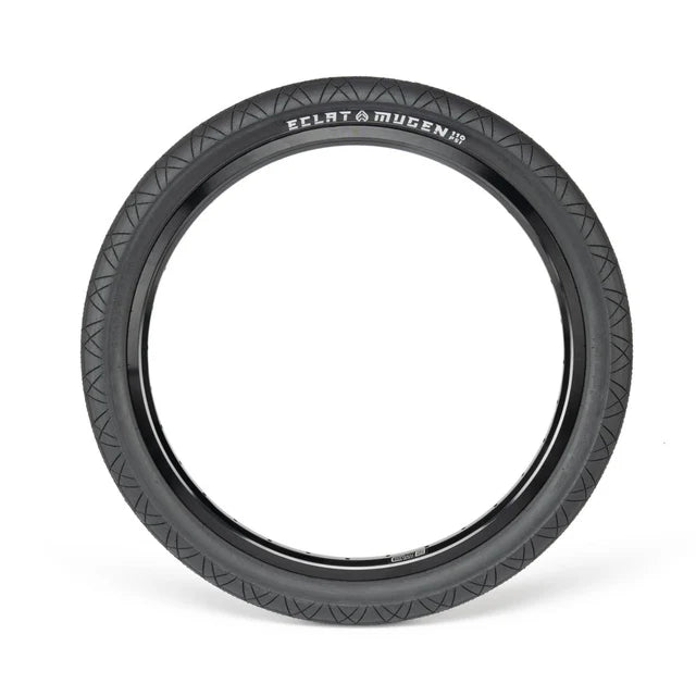 Éclat Mugen BMX Tire, 1.75" narrow width, all-black colorway, showcasing the subtle directional street tread.