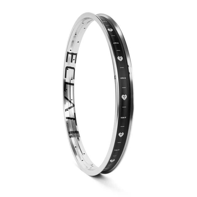 Éclat Trippin double-wall BMX rim with a polished silver finish, showing the ÉCLAT sidewall logo and the black internal rim strip graphics