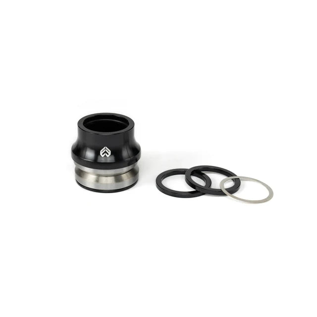 Éclat Wave 22 Integrated Headset, black and silver, shown disassembled with the top cap/bearing on the left and the included black and silver spacer rings on the right.