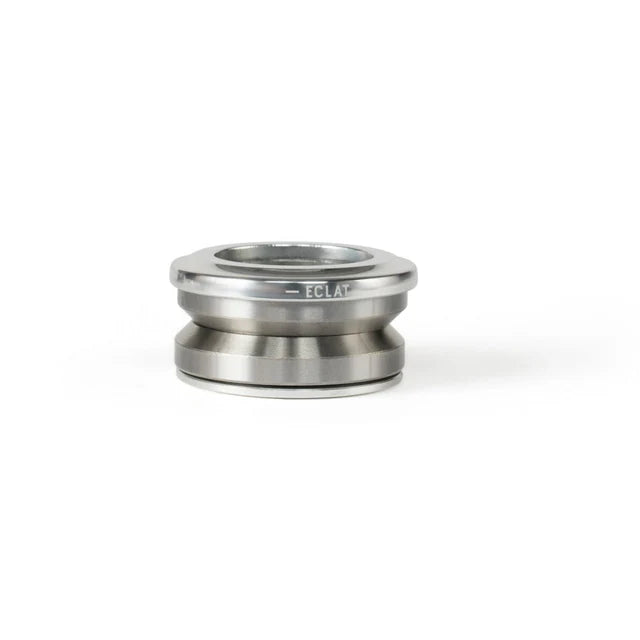 Éclat Wave 6 Integrated Headset, high polished silver finish, assembled view showing the bearings and the ÉCLAT logo on the top cap.
