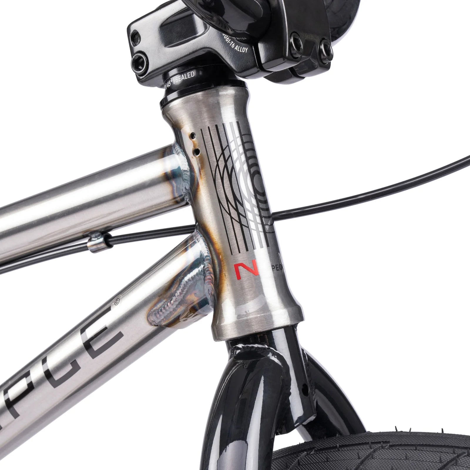 Close-up of a bicycle frame with visible branding on a white background