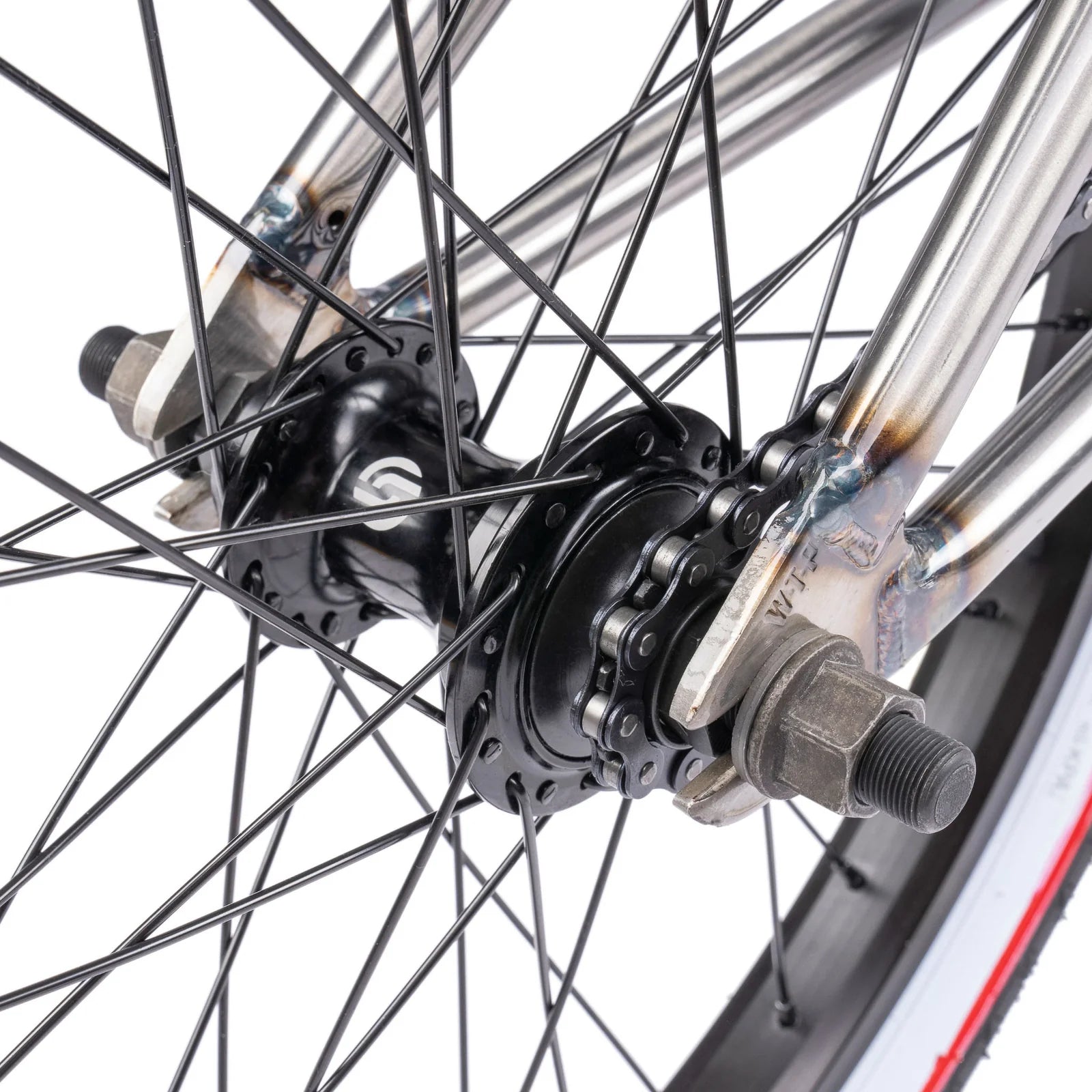 Close-up of a bicycle hub and chain on a white background